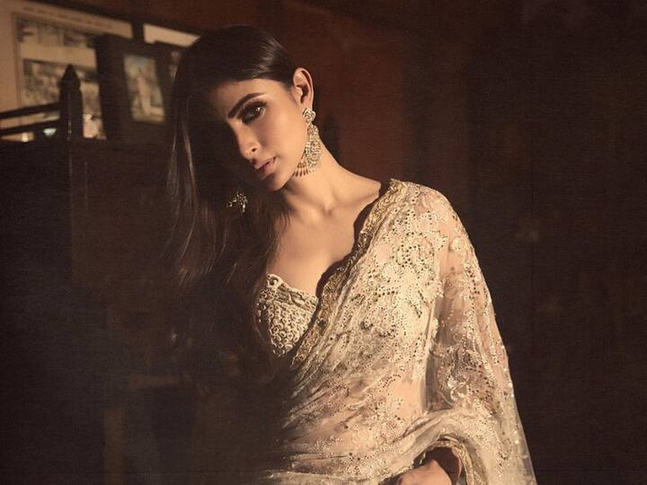 Mouni Roy treated fans with pictures in an off white saree looking the most elegant