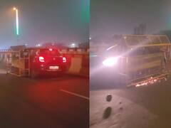 పోలీస్‌ బారికేడ్‌ని ఢీకొట్టిన కార్, కొంత దూరం వరకూ అలాగే లాక్కెళ్లిన డ్రైవర్ - వైరల్ వీడియో