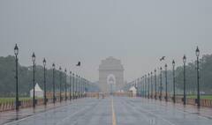 दिल्ली में बारिश के बाद लोगों ने ली राहत की सांस, प्रदूषण में आई कमी, देखें तस्वीरें