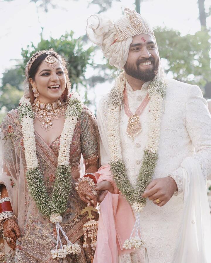 Lost in the love filled gazes of one another, the two lovebirds were staring at each other while being clicked.