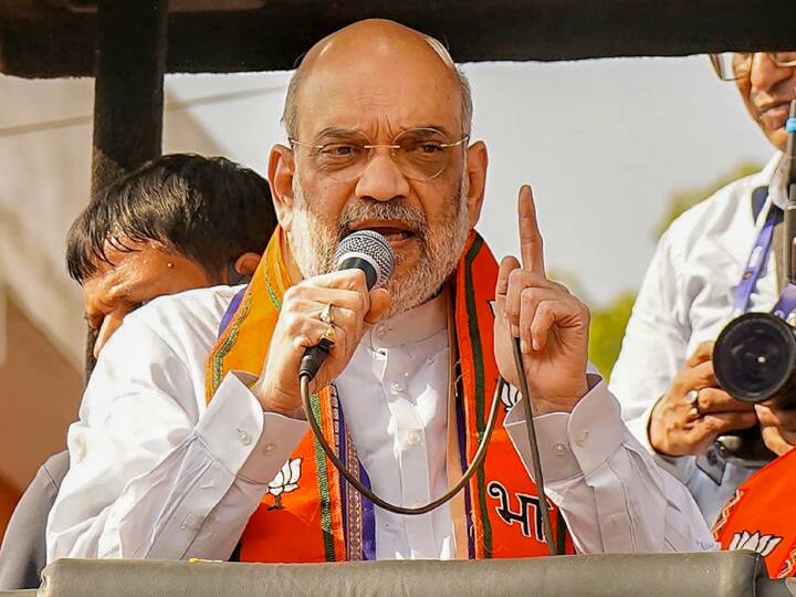 MP Election 2023: 'परिवारवाद का बीज बोने वाली कांग्रेस का होगा सफाया, एमपी में मनेंगी तीन दिवाली', धार में अमित शाह ने बोला हमला MP Assembly Election 2023 Amit Shah Dhar targets Rahul Gandhi Congress Diwali in Madhya Pradesh MP Election 2023: 'परिवारवाद का बीज बोने वाली कांग्रेस का होगा सफाया, एमपी में मनेंगी तीन दिवाली', धार में अमित शाह ने बोला हमला