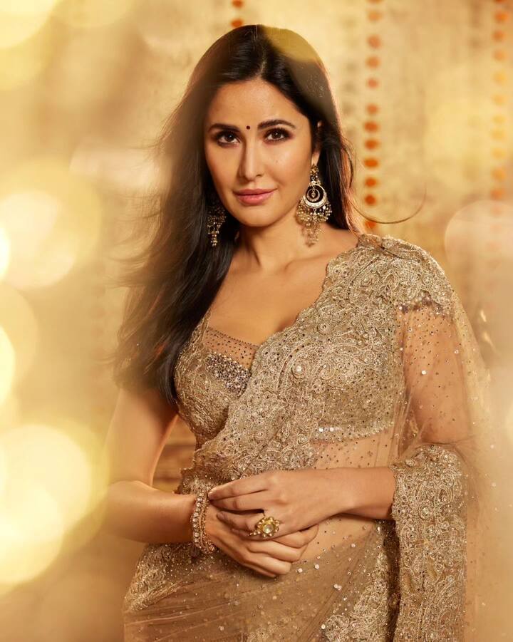 Her thick mascara lashes and light pink lipstick enhanced her beauty.