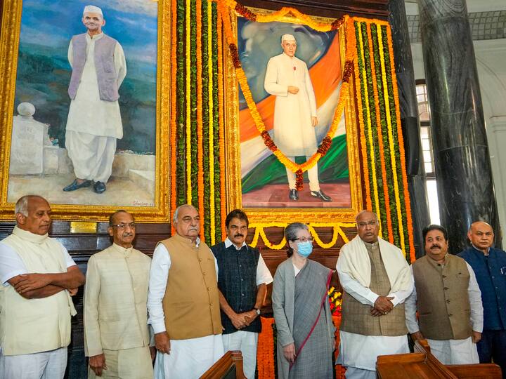 Congress President Mallikarjun Kharge with party leaders Sonia Gandhi, KC Venugopal, Rajeev Shukla, and others at the Central Hall of the old Parliament building after paying tribute to Pandit Nehru. (Source: PTI)