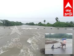 மரக்காணம் அருகே ஓங்கூர் ஆற்றில் வெள்ளப்பெருக்கால் மூழ்கிய தரைப்பாலம்