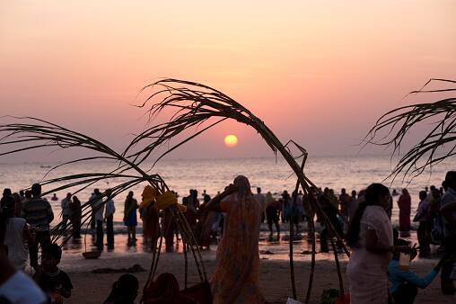 After bathing in the river, devotees don new clothes and partake in a meal. (Image Source: Getty)
