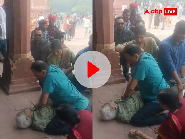 Man suddenly got heart attack after coming to Taj Mahal son saved life watch taj mahal viral video Taj Mahal आए पिता को अचानक आया हार्ट अटैक, फौजी बेटे ने यूं बचाई जान, लोगों का दिल जीत रहा ये Video