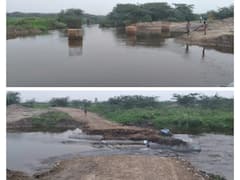 மறுகால் பாயும் தண்ணீரால் கீழக்கரந்தை அயன் வடமலாபுரம் சாலை தூண்டிப்பு