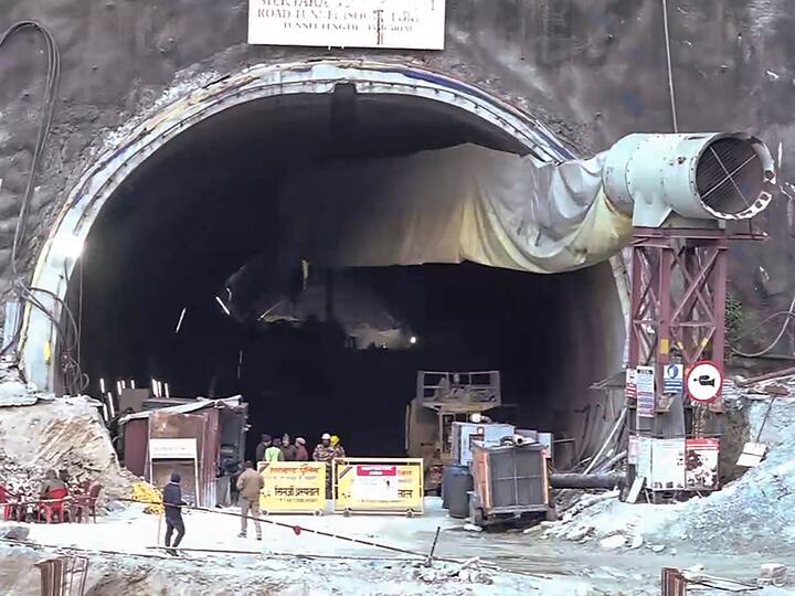 Security personnel have placed barricades outside the under-construction tunnel between Silkyara and Dandalgaon as rescue operations are ongoing to help bring out the 40 trapped workers. (Source: PTI)