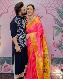 Rahul-Disha Pics: नामकरण सेरेमनी में बेटी के नन्हे कदमों को चूमते नजर आए राहुल वैद्य, फैंस के साथ शेयर की दिल छू लेने वाली तस्वीरें