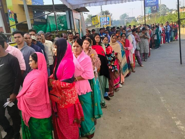 People queue up for their turn to vote during the second phase of the Chhattisgarh Assembly Elections in Sarguja district. (Source: X/@ECISVEEP)