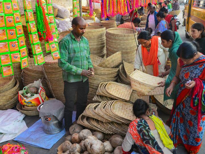 People shop for fruits, diyas, other materials in Jalandhar, Punjab ahead of Chhath Puja . (Source: PTI)