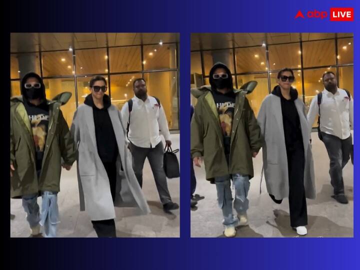 Deepika Padukone Ranveer Singh spotted at Mumbai Airport today after celebrating 5th wedding anniversary in Brussels विदेश में शादी की 5वीं वेडिंग एनिवर्सरी सेलिब्रेट कर मुंबई लौटे Deepika-Ranveer, एयरपोर्ट पर एक-दूसरे का हाथ थामे स्पॉट हुआ कपल