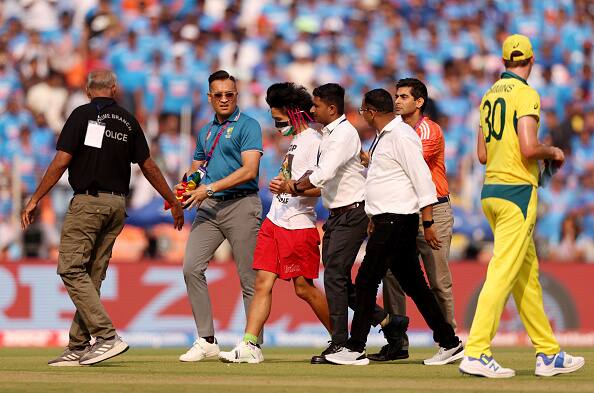 The pro-Palestine supporter was apprehended by security, removed from the field and play resumed. (Photo: Getty Images)