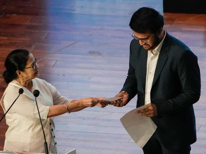 West Bengal CM Mamata Banerjee named former cricketer Sourav Ganguly as the brand ambassador of the state during the inaugural session of the Summit. PTI