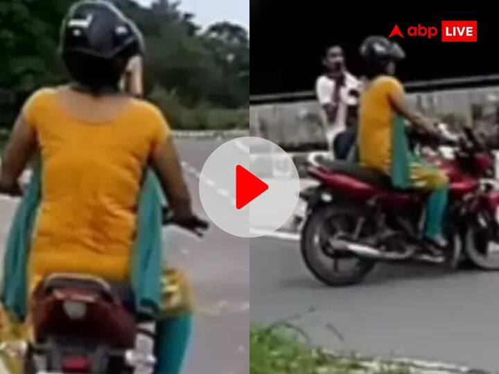 Man told his wife to put break in her bike accident video went viral watch बीवी को बाइक चलाना सिखा रहा था शख्स, ब्रेक लगाने को बोला तो हो गया बड़ा कांड, देखें VIDEO