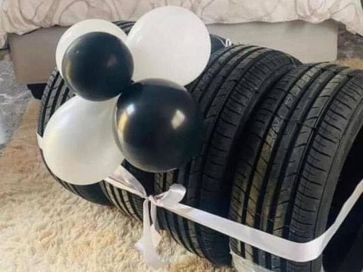 Women gifted Tires to her husband on the first anniversary picture went viral Viral: 'इतना बड़ा दिल...', पहली सालगिरह पर पत्नी ने पति को गिफ्ट में दिए टायर्स, लोगों ने यूं लिए मजे