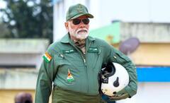 Narendra Modi: সকাল সকাল আকাশে চক্কর, ধোপদুরস্ত সাজে ‘তেজস’-সওয়ার মোদি