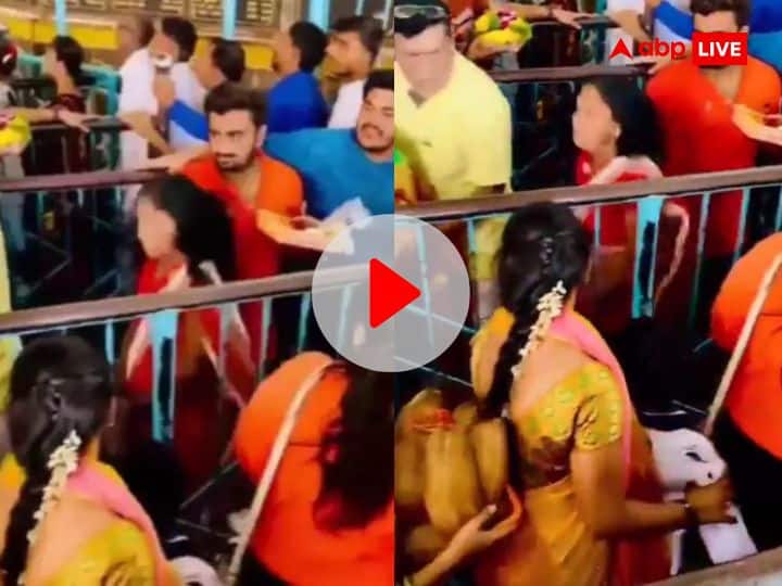 Woman finds easy way to skip the queue in a temple watch viral video Video: मंदिर में दर्शन के लिए लगी थी लंबी लाइन, महिला ने की ऐसी हरकत लोगों ने खुद दे दी जगह, देखें वीडियो