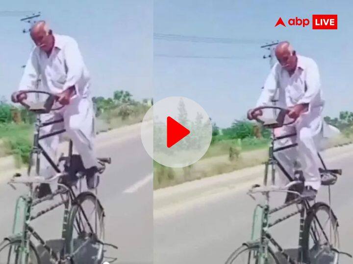 elderly man is seen riding a bicycle on the road but different in structure watch viral video VIDEO: बस तो देखा होगा लेकिन क्या आपने देखा है डबल डेकर साइकिल? वीडियो देख लोग बोले- 'क्या जुगाड़ है'