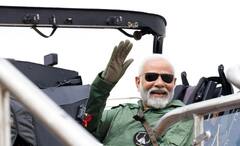 Narendra Modi: সকাল সকাল আকাশে চক্কর, ধোপদুরস্ত সাজে ‘তেজস’-সওয়ার মোদি