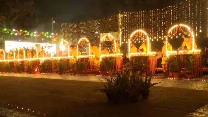 গঙ্গার ঘাটে শয়ে শয়ে প্রদীপ, আলোকমালায় সাজানো ঘাট, সুসজ্জিত রঙ্গোলি, লাল কার্পেটের ওপর প্রদীপের সারি।