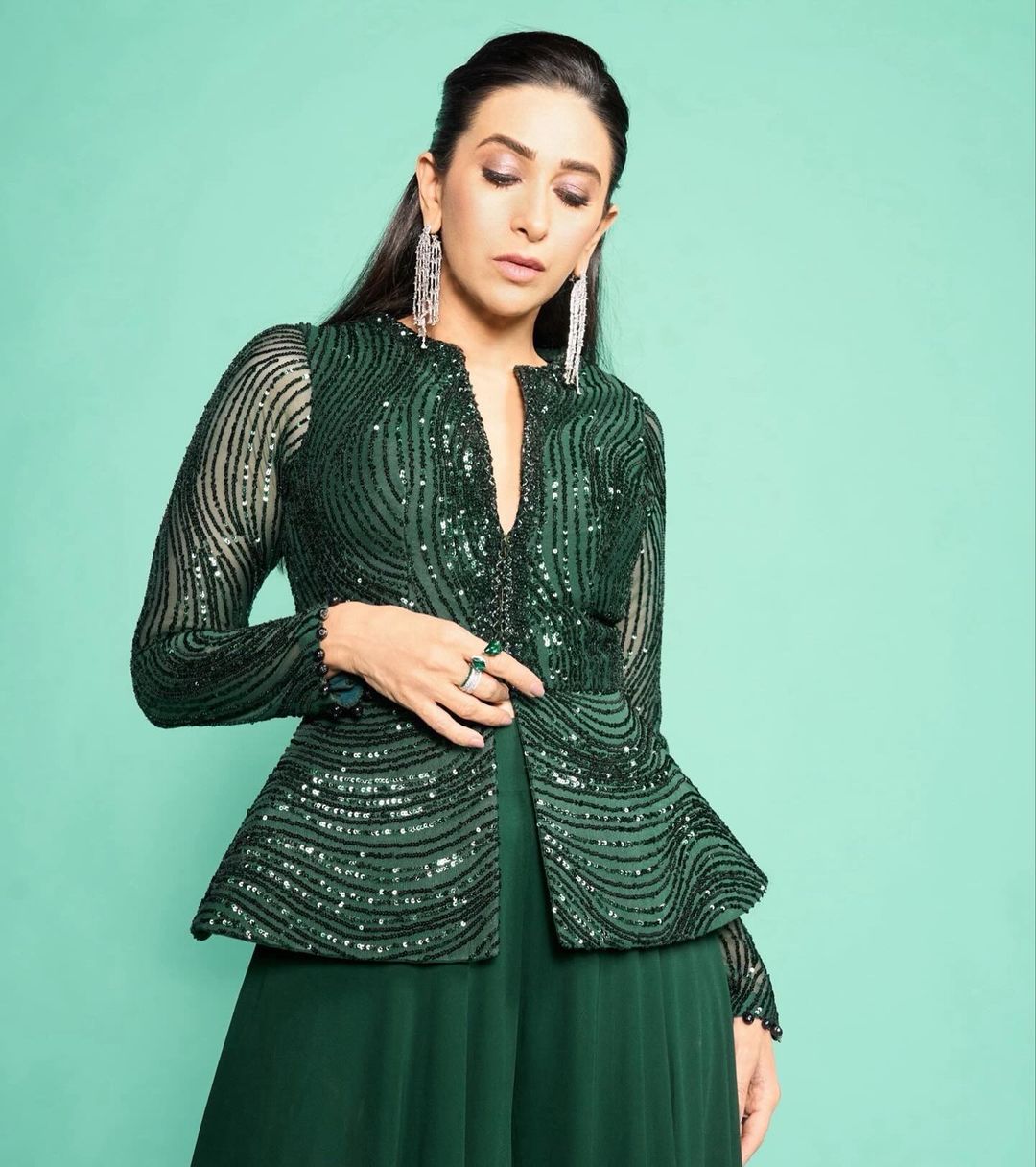 Karisma Kapoor Looks Ready, Steady For Christmas in Green And Black Dress