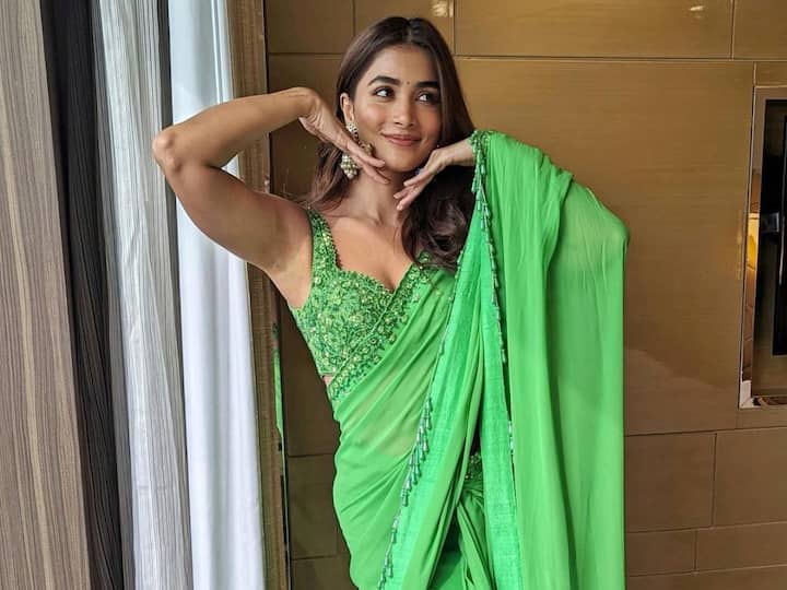 Pooja Hegde treated fans with pictures in a green saree looking the most elegant. Take a look at her saree pics