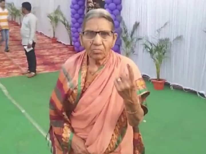 An elderly woman stops for a photo after voting in the Telangana Assembly Elections. (Source: ANI)
