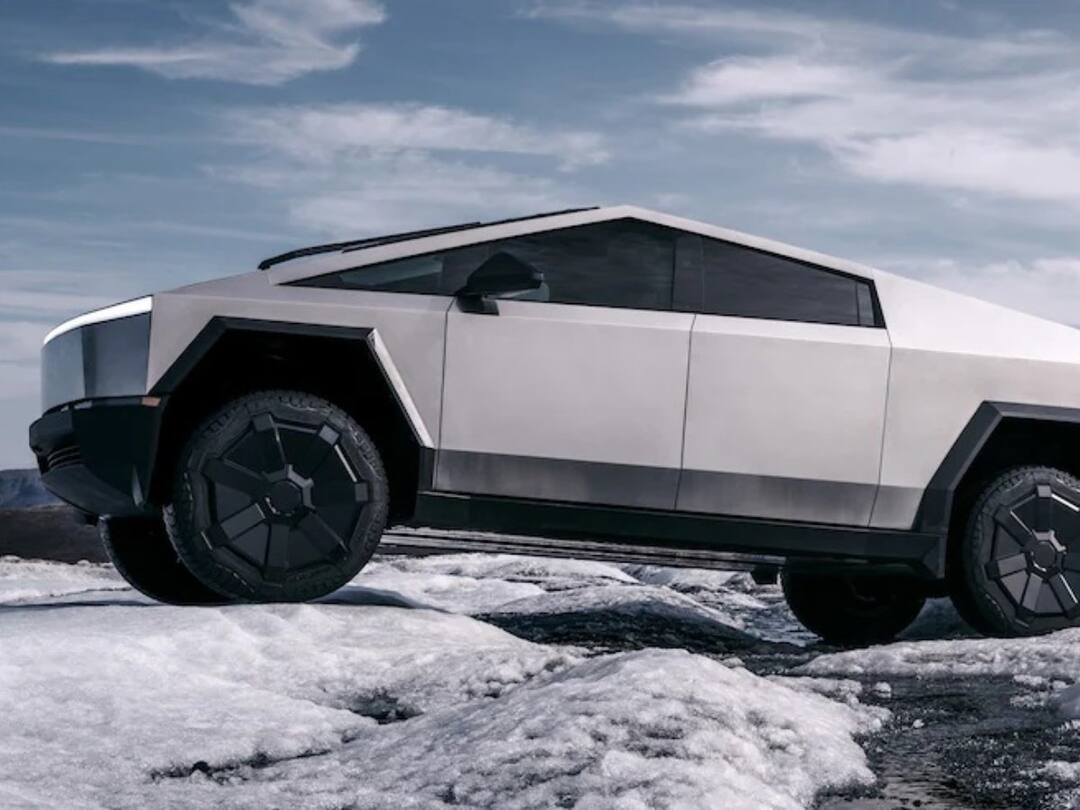 Tesla Cybertruck Price Revealed By Elon Musk Check Range Features Details Tesla Cybertruck: మోస్ట్ అవైటెడ్ టెస్లా సైబర్ ట్రక్ రేట్ చెప్పిన మస్క్ - అనుకున్నదానికంటే 50 శాతం ఎక్కువగా!