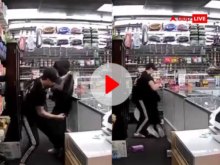 Video A woman entered wearing a burqa to rob a shop man spoiled CCTV video goes viral Video: दुकान लूटने के लिए बुर्क़ा पहनकर घुसी महिला, शख्स ने बिगाड़ दिया पूरा 'खेल', CCTV वीडियो वायरल