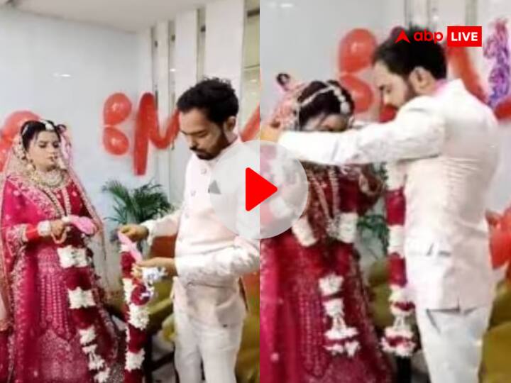 Watch: प्यार ऐसा भी! शादी वाले दिन दूल्हे को हुआ डेंगू, बिना 'बैंड बाजा बारात' के अस्पताल में हुई शादी, देखें वीडियो Groom admitted to ghaziabad hospital due to dengue gets married watch couple viral video Watch: प्यार ऐसा भी! शादी वाले दिन दूल्हे को हुआ डेंगू, बिना 'बैंड बाजा बारात' के अस्पताल में हुई शादी, देखें वीडियो