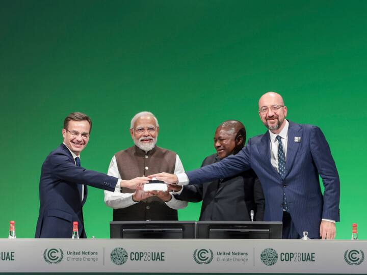 PM Modi with Sweden's Prime Minister Ulf Kristersson, President of Mozambique Filipe Jacinto Nyusi and European Council President Charles Michel at a high-level event on Green Credits Programme during the COP28, in UAE on Friday. (Source: PTI)