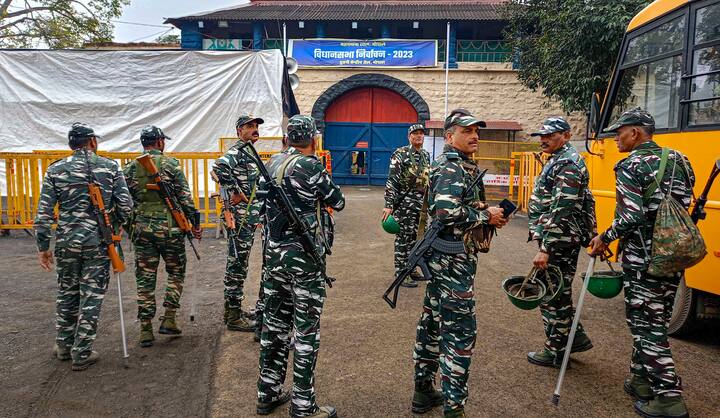 Security personnel stand guard at Old Central Jail ahead of the counting of votes of Madhya Pradesh Assembly elections, in Bhopal. (PTI Photo)