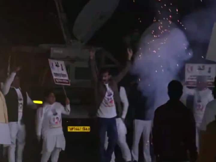 Congress supporters gather outside the Congress office and burst crackers ahead of the Assembly Election results. (Source: ANI)
