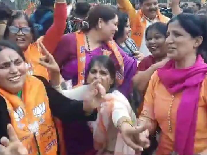 BJP workers dance and celebrate at the party office in Jaipur as the party continues its lead in Rajasthan. (Source: ANI)