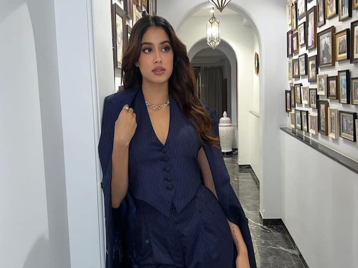 In her most recent pictures, Janhvi Kapoor is seen sporting a pinstriped powersuit and looking stylish.