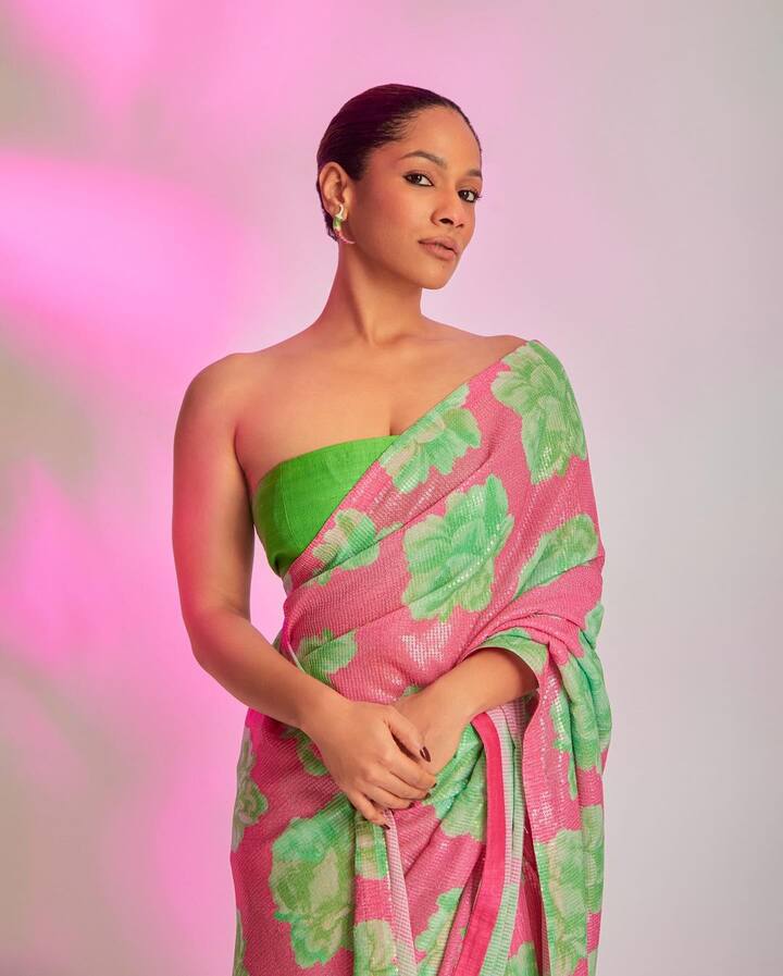 Masaba Gupta captivates in a pink saree with green floral prints and a green tube blouse. (Image: Instagram/@masabagupta)