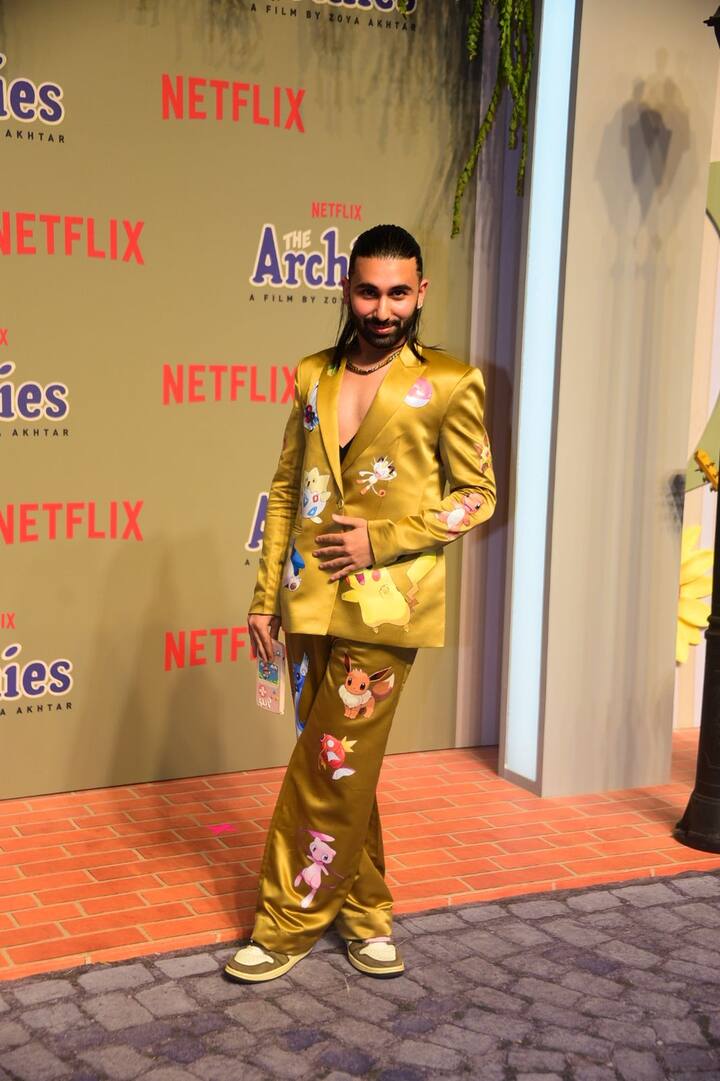 Orry is seen posing for the photos.