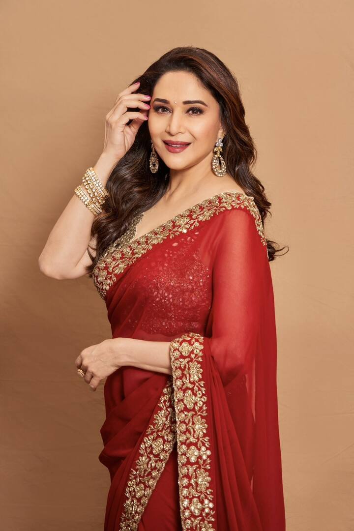 Madhuri Dixit, a legendary figure in Bollywood, graces the judge's seat on 'Dance Deewane' and several other shows. Her magnetic presence and graceful judgments contribute to the show's success, making her an enduring favourite. (Image Source: Special Arrangement)