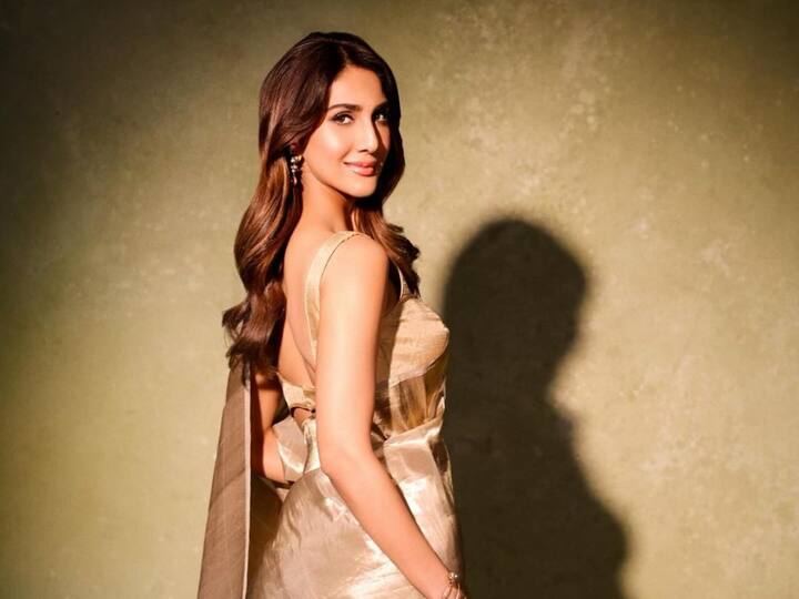 Vaani Kapoor sets a fashion trend for the forthcoming wedding season by radiating charm in a beautiful golden silk saree.