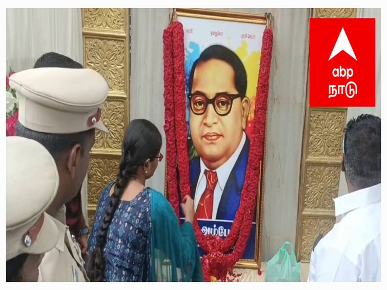 Mayiladuthurai large number of policemen gather at the Ambedkar Memorial Day ceremony TNN பலத்த போலீஸ் பாதுகாப்புடன் பட்டவர்த்தியில் அம்பேத்கருக்கு மரியாதை செய்த அதிகாரிகள்