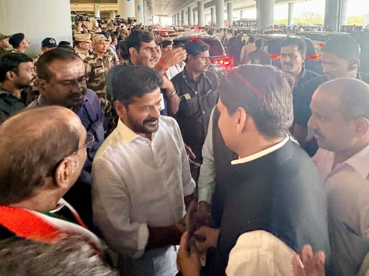 Congress MP Deepender Singh Hooda and Telangana CM-elect Revanth Reddy greet each other at Hyderabad Airport. (Source: X/@DeependraSHooda)
