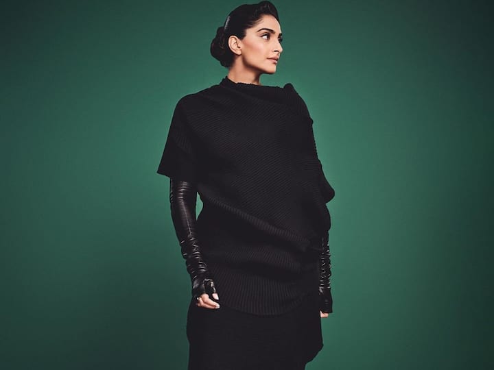 Sonam Kapoor has an air of refined allure while wearing a black winter dress.