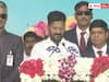 revanth reddy take oath as telangana cm  :  మేం పాలకులం కాదు మీ సేవకులం - ఆరు గ్యారంటీల అమలుపై  రేవంత్ తొలి సంతకం