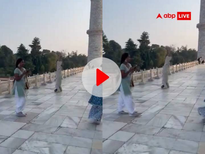 Taj mahal viral video man performed yoga on the dome video surfaced watch Viral Video: ताजमहल का दीदार करने आए पर्यटक ने गुंबद पर चढ़कर कर दी ऐसी हरकत, वायरल हुआ वीडियो