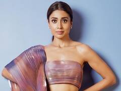 Shriya Saran Photos : வழுவழு உடையில் பளபளக்கும் நடிகை ஸ்ரேயா சரண்!