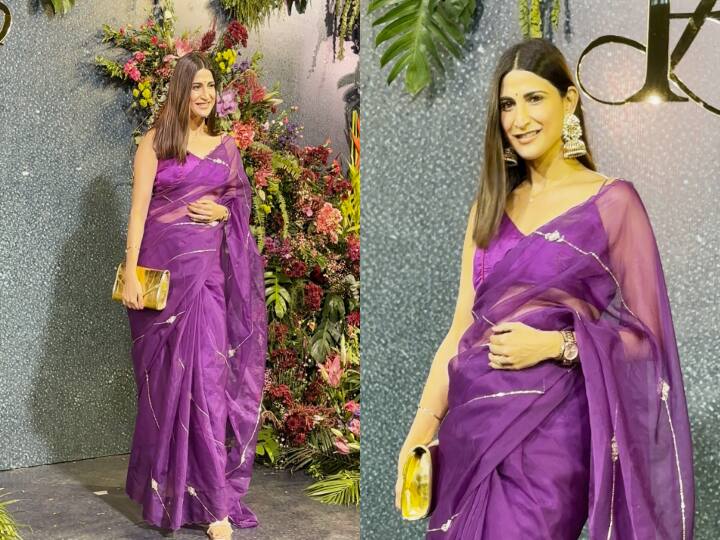 पार्टी में अहाना कुमरा को पर्पल साड़ी में देखा गया. स्लीवलेस ब्लाउज, हैवी जूलरी और खुले बालों में एक्ट्रेस काफी हसीन दिख रही थीं.