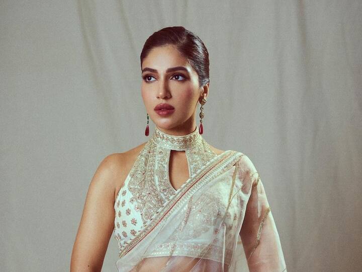 Bhumi Pednekar looked stunning in a halter-neck top and a white and gold saree.