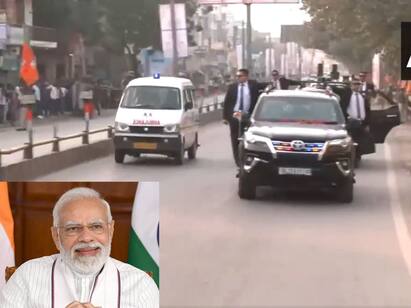 PM Modis convoy gives way to ambulance during Varanasi roadshow Watch Video : பாய்ந்து வந்த ஆம்புலன்ஸ்.. ஒதுங்கி வழிவிட்ட பிரதமர் மோடியின் அணிவகுப்பு.. வாரணாசியில் ரோட் ஷோ