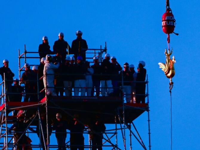 New Golden Rooster Fitted To Spire Of Paris' Notre Dame Cathedral